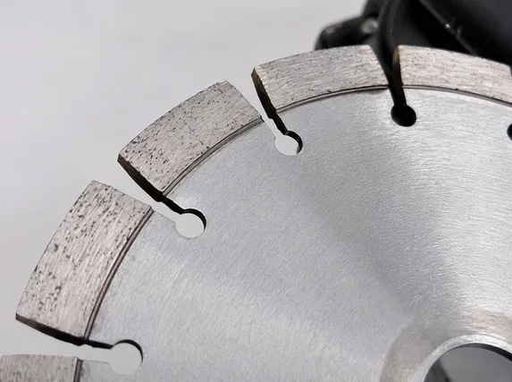 Close-up of wider diamond segments providing adequate clearance in cut slot