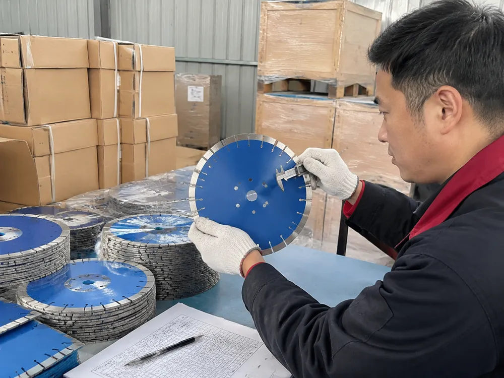 Export QC and Packaging Technician performing final quality inspection and packaging of diamond cutting discs for export shipment
