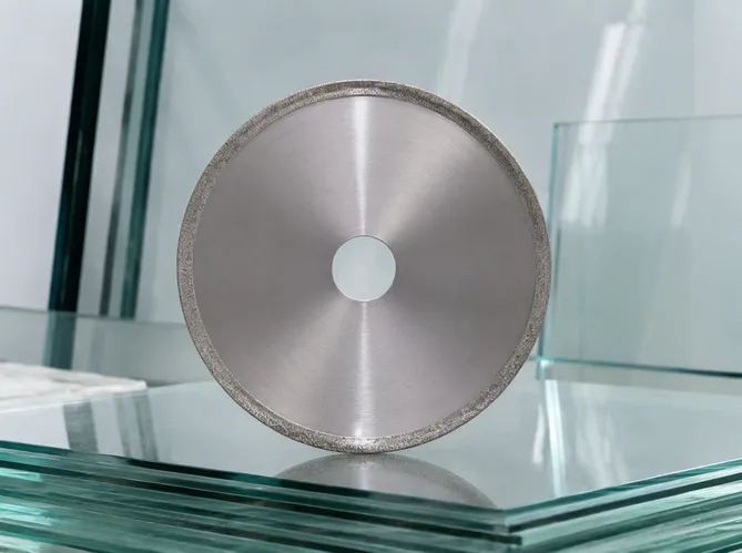 Electroplated diamond blade for glass cutting - thin kerf continuous rim design