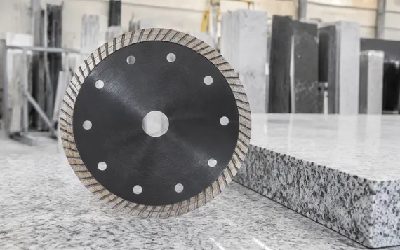 Turbo rim granite diamond cutting disc with continuous serrated rim for cleaner cuts