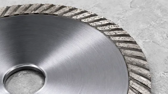 Close-up of turbo rim diamond blade showing serrated wave pattern