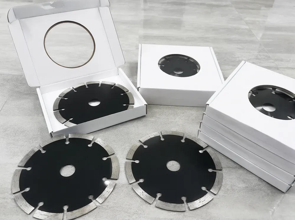 Sample segmented diamond cutting discs in neutral packaging ready for field testing