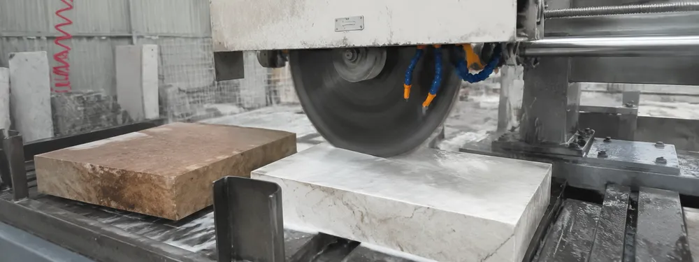 Diamond cutting disc quality assurance bench testing on marble and sandstone blocks