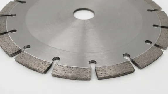 Segmented rim diamond cutting disc showing gullet spacing for debris clearance