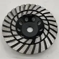 Turbo diamond cup grinding wheel with angled channels