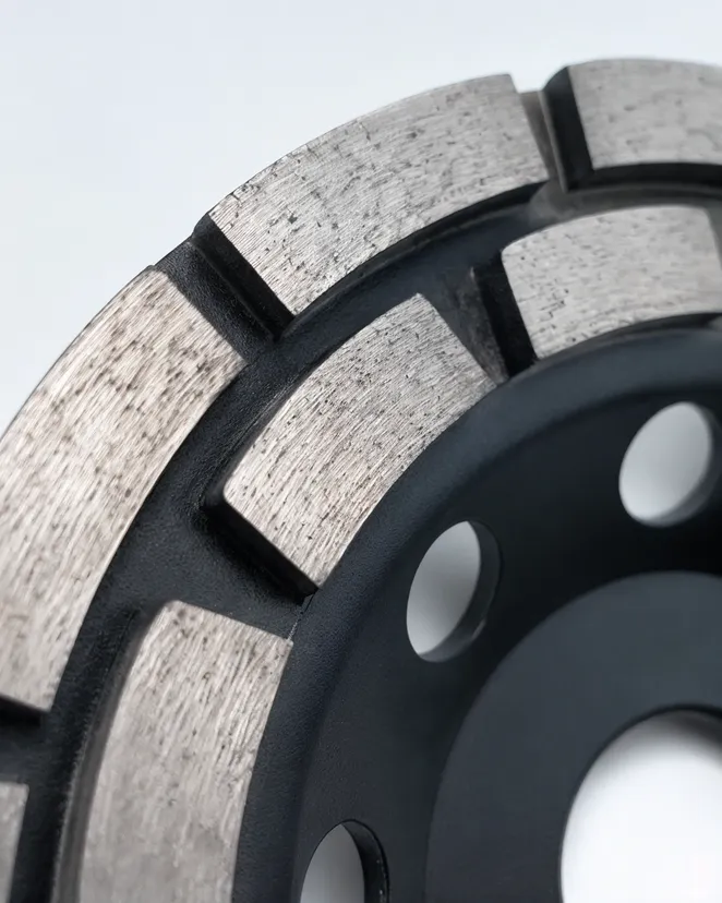 Close-up of diamond grinding disc segment geometry showing sintered metal bond structure