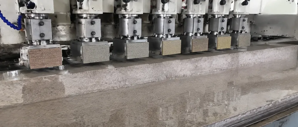 Fickert grinding blocks mounted on European-spec calibration machine for stone surface processing