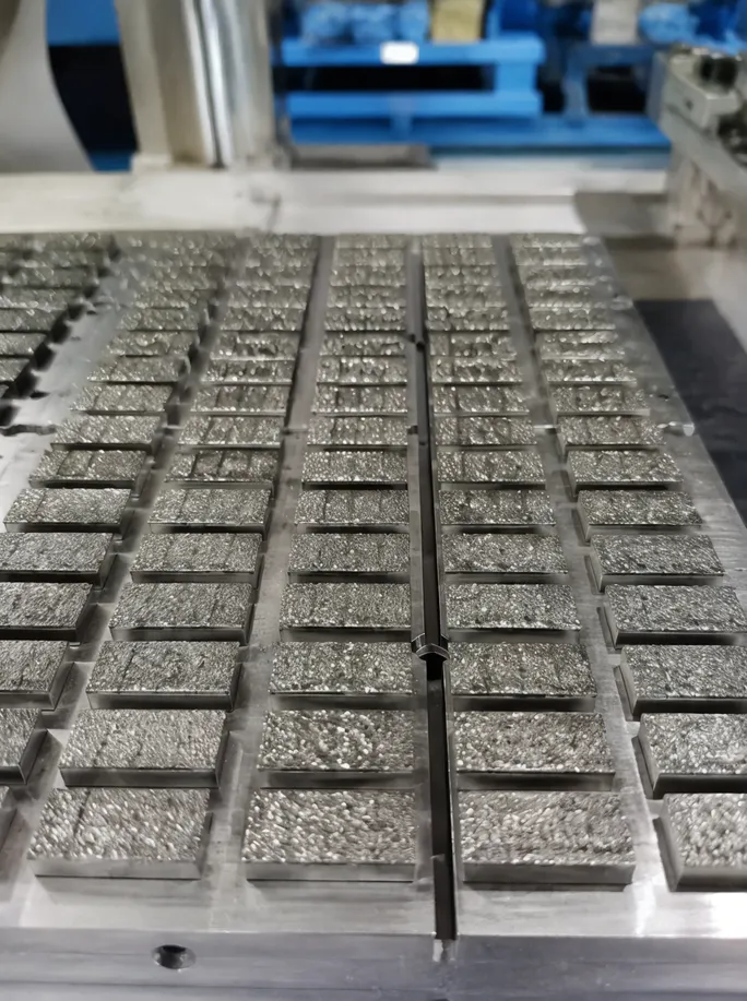 ARIX segment sintering process showing precision diamond layer placement in a controlled geometric grid