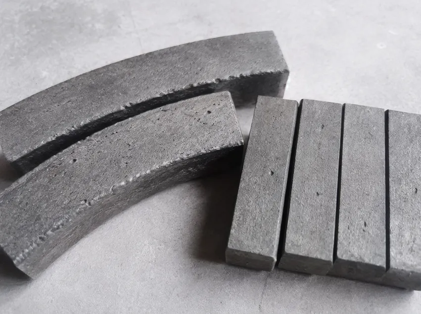 Iron-cobalt soft bond matrix with controlled porosity for asphalt diamond blade segments
