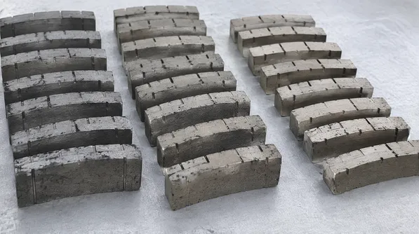 Granite gang saw blade segments optimized for hard granite abrasion characteristics