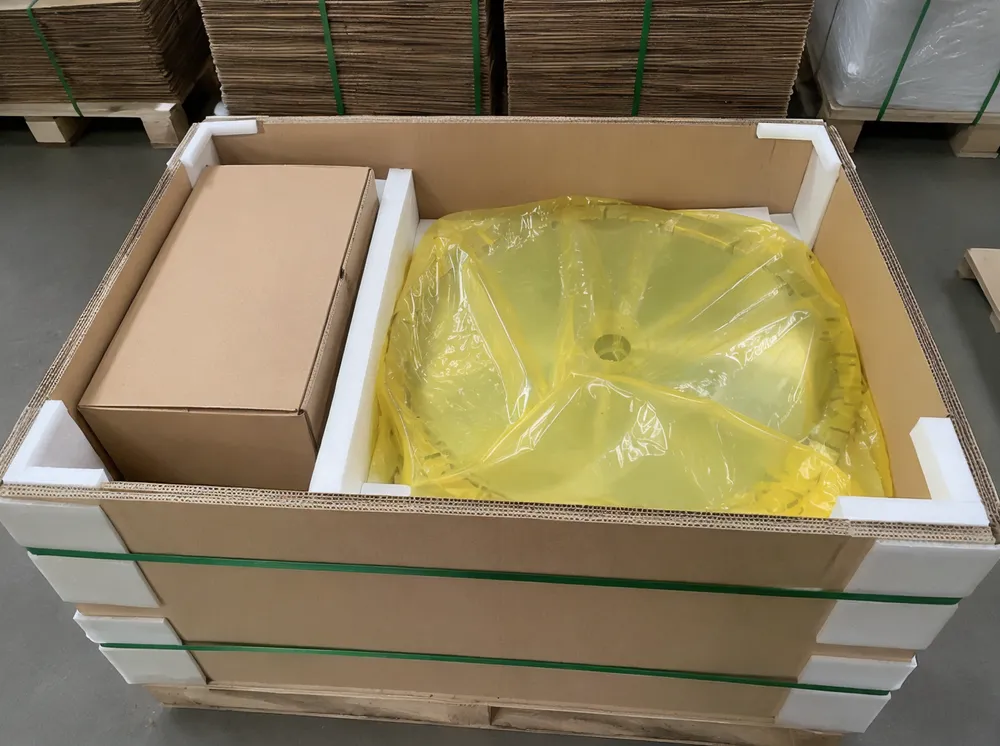 Granite saw blade packaging showing VCI wrap, foam separators, inner box, and reinforced outer carton with edge guards