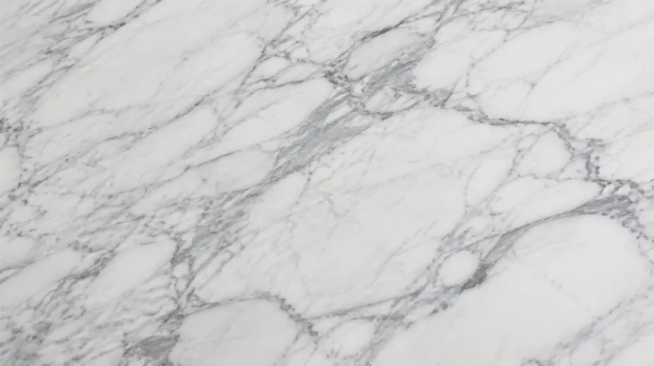 Crystalline marble slab — medium-grained Volakas with visible grey veining pattern