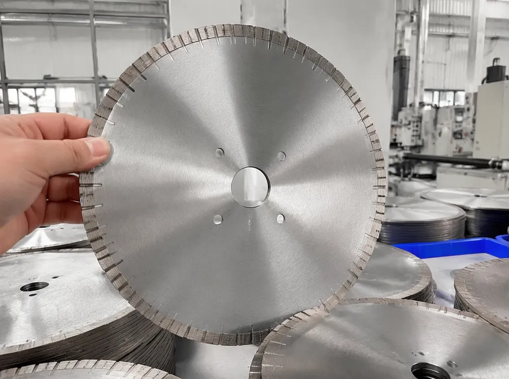 CLSEG sintered stone saw blade showing ultra-thin diamond segments for precision cutting of large porcelain slabs