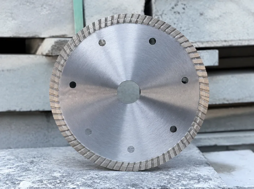 Turbo diamond saw blade with continuous serrated rim profile for fast cutting on stone and concrete