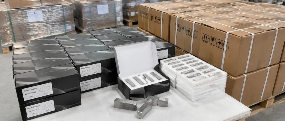 OEM private-label diamond segment packaging with branded boxes, inner foam trays, and export cartons ready for ocean freight